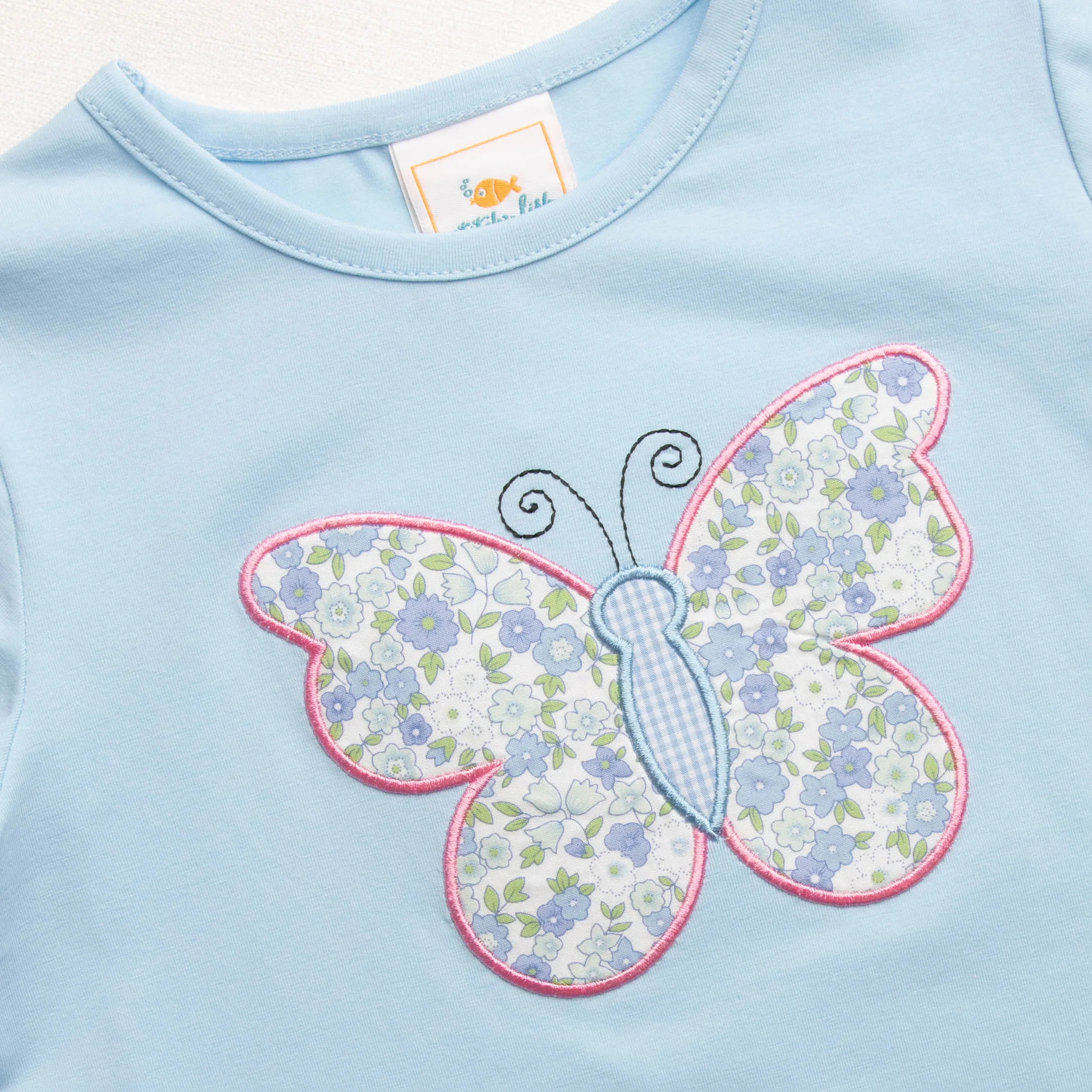 Butterfly Kisses Applique Ruffle Shirt, Blue