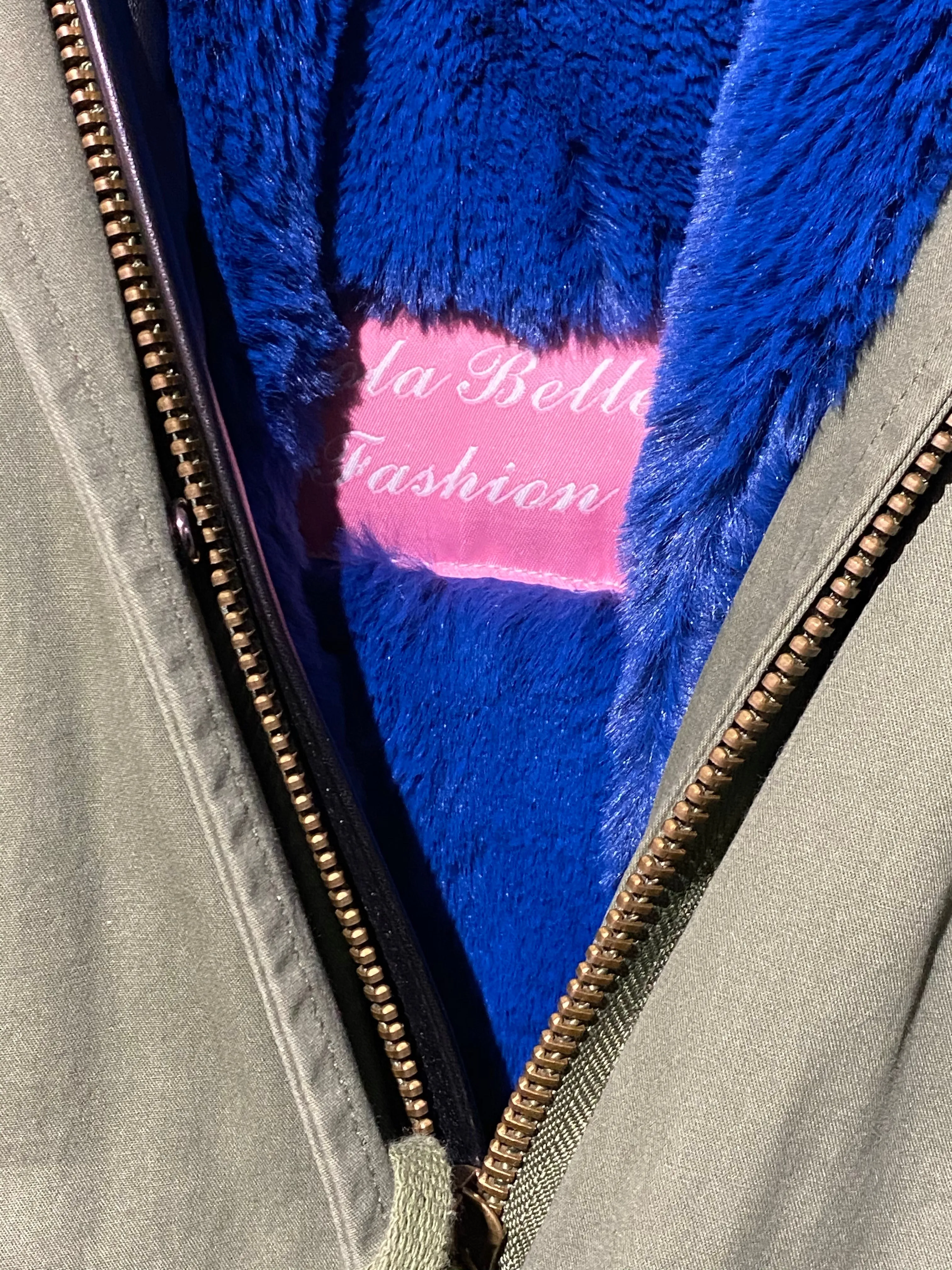 Lola Belle Green Jacket with Blue Lining and Blue Fur Lined Hood
