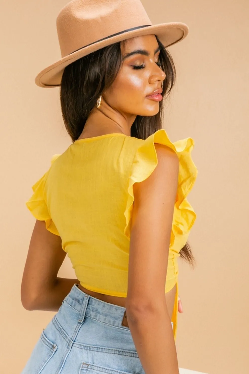 Plunge Neckline With Tie Front Ruffle Top
