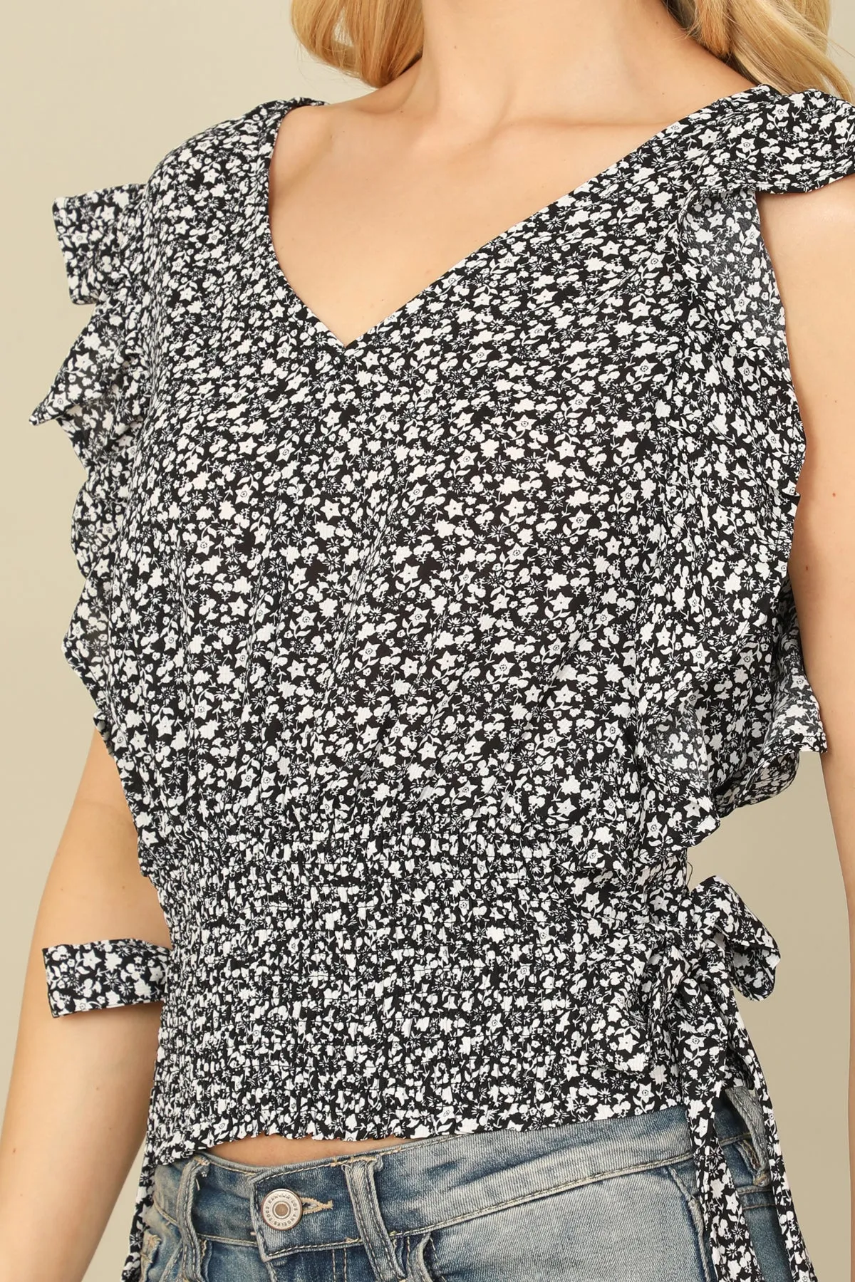 RUFFLE SLEEVELESS SIDE RIBBON SMOCKED WAIST FLORAL TOP